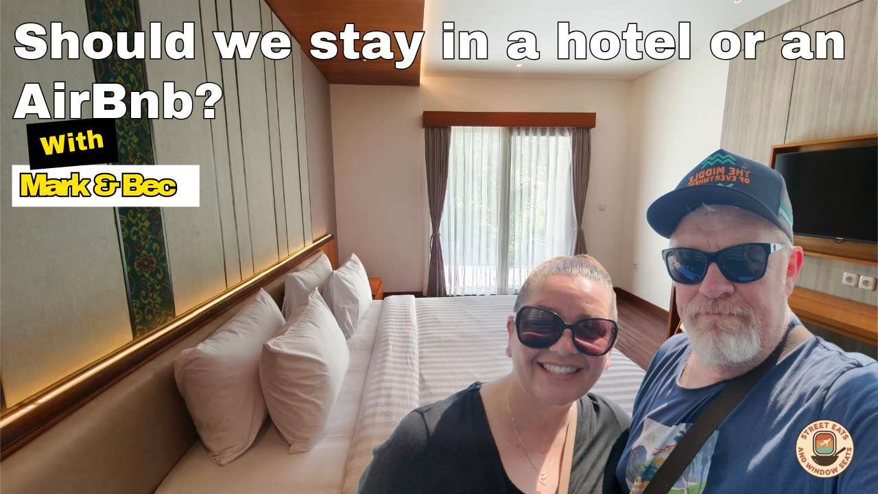 A COUPLE IN A HOTEL ROOM