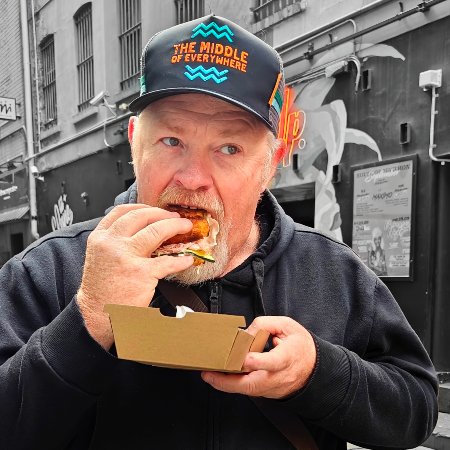 Mark and Bec eating street food in Melbourne Australia
