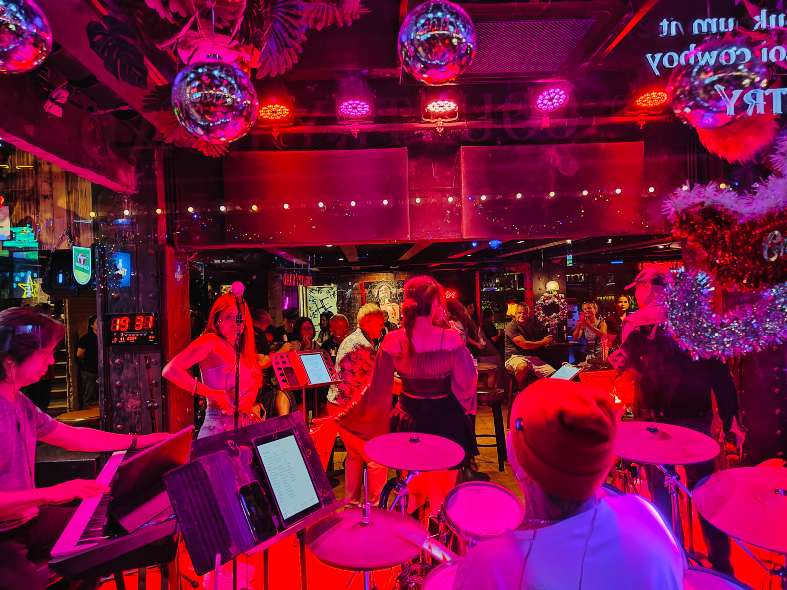 A live band playing at the Penny Black Bar in Soi Cowboy Bangkok