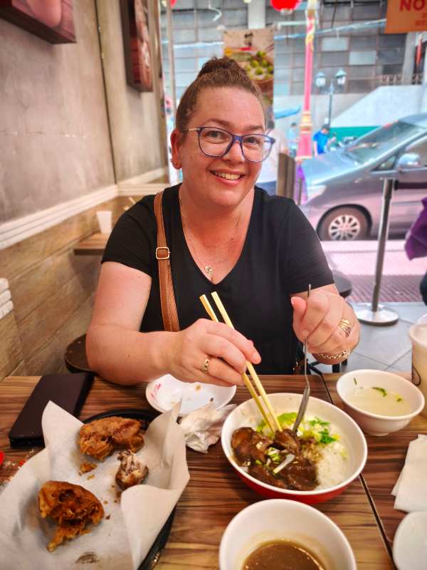Mark and Bec eating in Manila