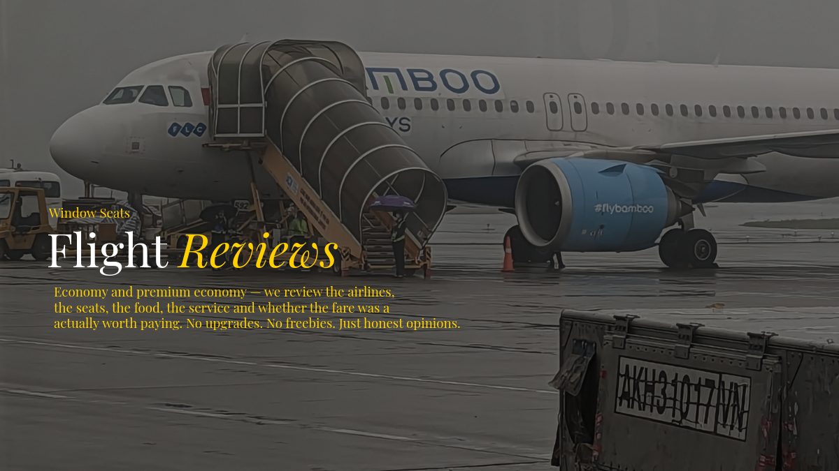 a bamboo airline plane sitting on the runway at Hue in Vietnam