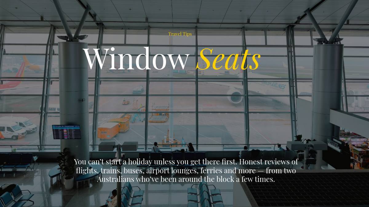 looking out the windows at the planes at Tan Son Nhat International Airport