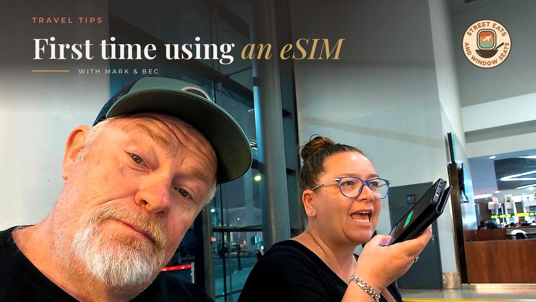 mark and bec using their phone with an esim