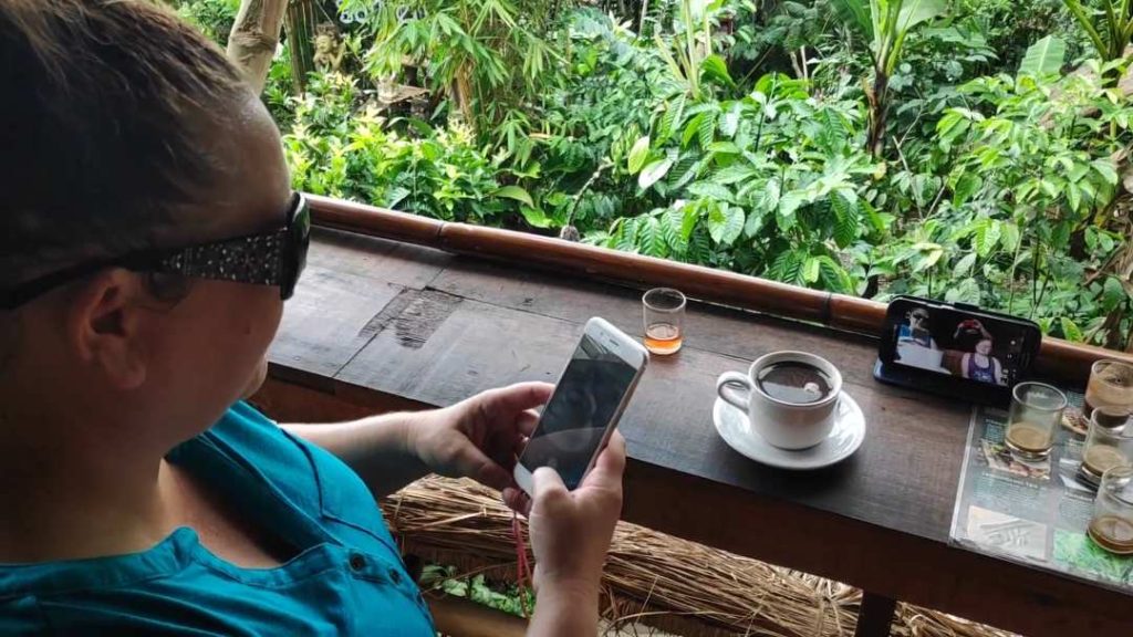 Using a mobile phone with an eSIM in Bali Indonesia to book a Grab and stay connected while travelling
