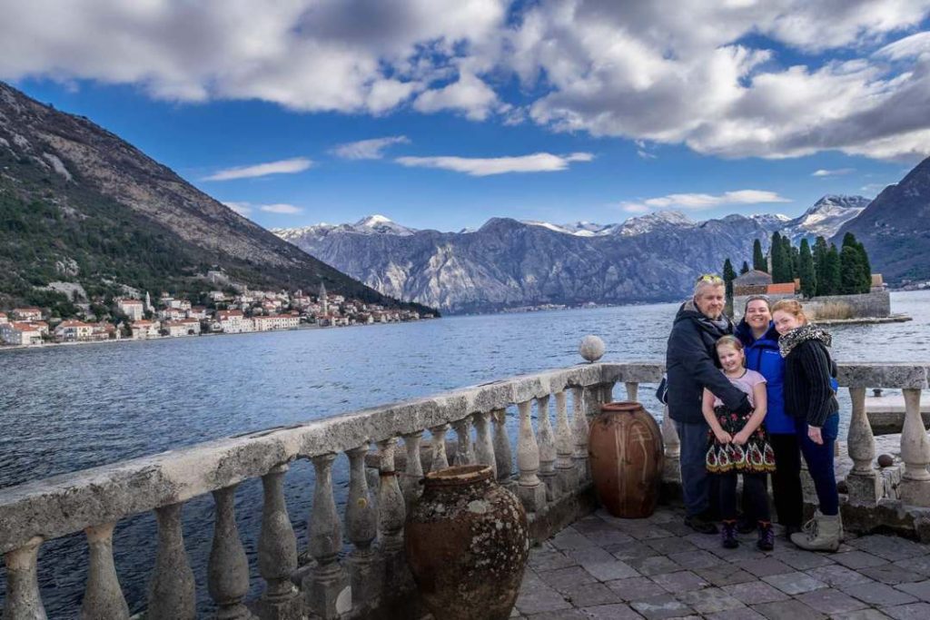 Mark Bec and their two daughters at the Bay of Kotor Montenegro during their 14 month family long term travel trip in 2019