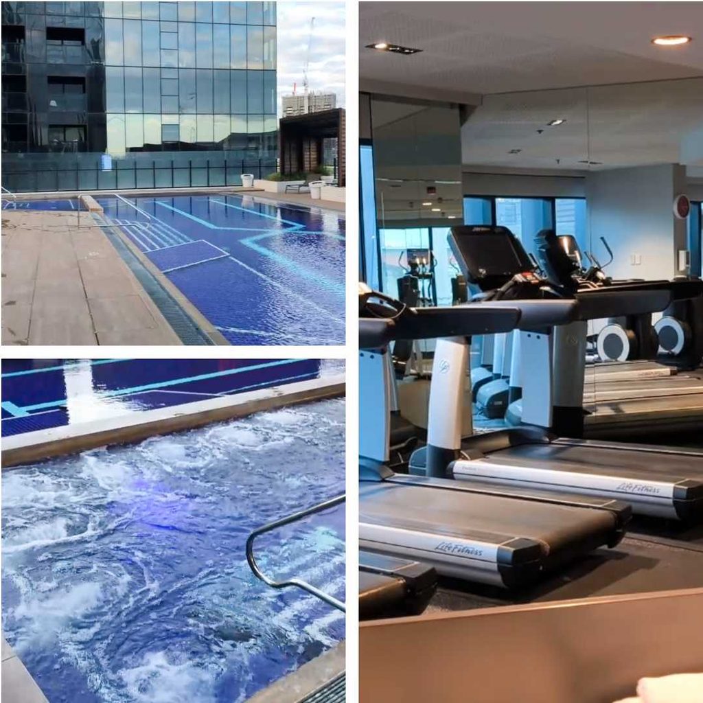 Rooftop pool spa and gym with Life Fitness treadmills on the 7th floor at Vibe Hotel Docklands Melbourne